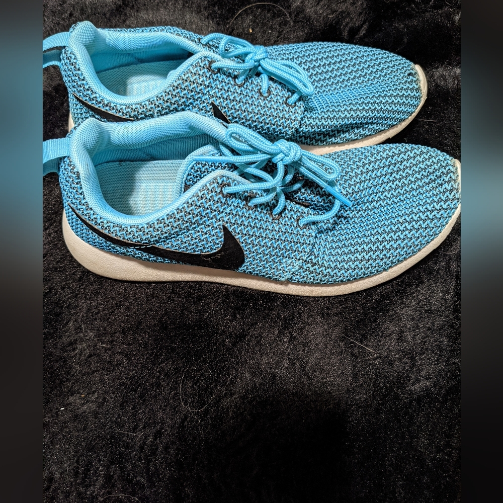 Women Size 7.5 Nike Running shoes. Good condition.